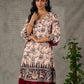 Beige traditional printed dress with rich maroon accents.