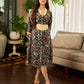 Classic bottle green Kalamkari printed dress with a beige elegant pintuck detailing.