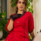 Elegant red dress featuring delicate, hand-painted Madhubani lotus motif detailing.