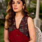Statement sleeveless Ajrakh dress elevated with a folded collar and graceful maroon pleats.