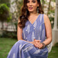 Graceful powder blue Ikat dress showcasing layered overlap details highlighted with white accents.