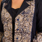 Elegant black and navy Kalamkari jacket featuring a notch collar and subtle navy accents, creating a graceful, tailored silhouette suited for polished corporate wear.