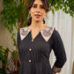 Timeless black stripes accented with exquisite hand-painted Madhubani on collars and cuffs