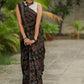 Pure modal silk ajrakh block printed black designer saree with floral motifs