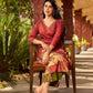 Classic deep rustic maroon kurta with detailed hand embroidery, statement olive and cream Pichwai artwork, and rich gold highlights