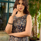 Stunning black Kalamkari overlap dress featuring a chic asymmetrical gathered hem.