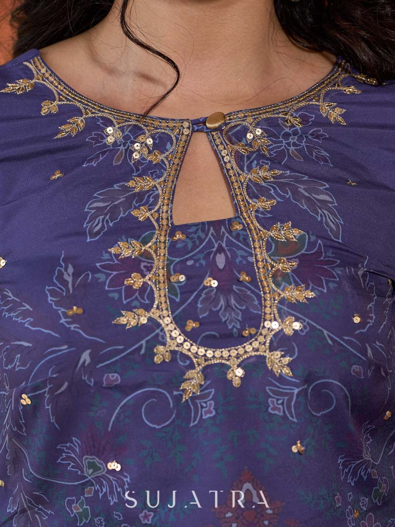 Stunning royal blue printed kurta adorned with handcrafted zardozi and sequin detailing on the keyhole neck.