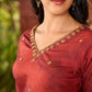 Classic deep rustic maroon kurta with detailed hand embroidery, statement olive and cream Pichwai artwork, and rich gold highlights