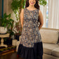 Stunning black Kalamkari overlap dress featuring a chic asymmetrical gathered hem.