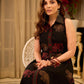 Statement black sleeveless shirt dress showcasing elephant-inspired prints and polka dots, highlighted with maroon accents.
