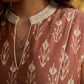 Chic champagne beige Ikat dress elevated with Hakoba accents, a relaxed drop-shoulder fit, mandarin neckline, and fluid side gathers detailed with Hakoba flaps.
