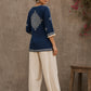 Captivating navy top adorned with a bold, rhythmic block print design, pleated sleeve detailing, and a versatile cut.