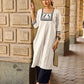 Timeless Off-White Cotton Kurta Featuring Hand Painted Warli Folk Art Yoke & Cuff Band