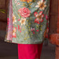 Soft green printed kurta with vibrant floral motifs, highlighted with hand embroidery and bright magenta accents.