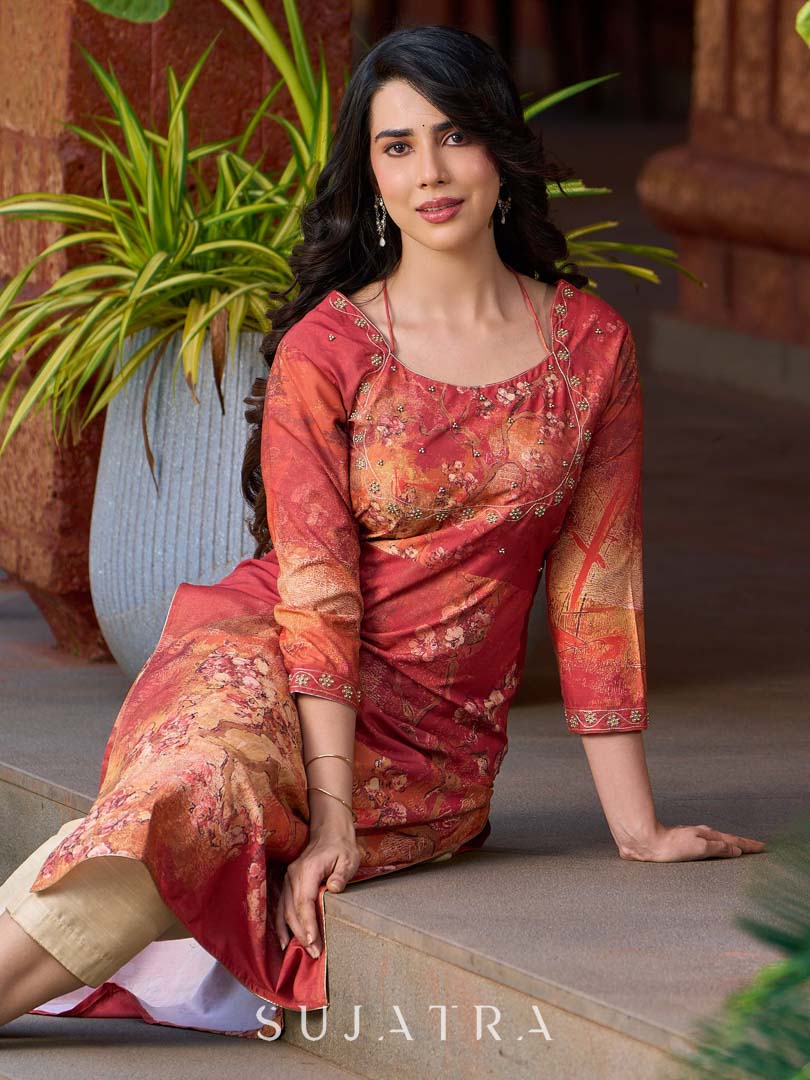 Amber crimson blossom printed kurta with golden pearl handwork on the yoke and dainty tie-up neck details.