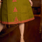 Gorgeous olive dress with pink abstract triangle hand block prints placed at the centre, sleeves, and back, featuring a mandarin collar and half sleeves for a refined, contemporary look.