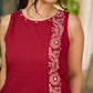 Maroon block printed sleeveless dress with hand block printed floral side panel, off-white accents, and pearl embellishments for a refined, elegant look.