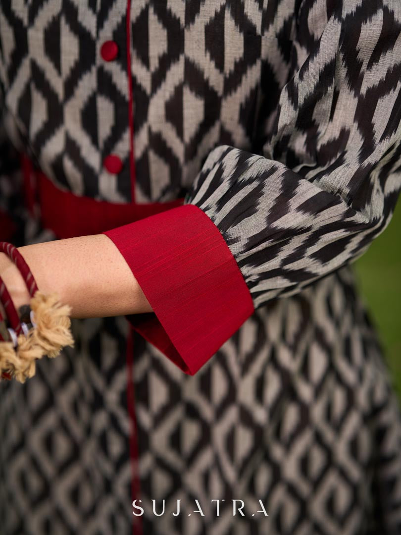 Elegant black grey mercerised Ikat shirt dress featuring a soft square neck, subtle maroon detailing, and a waist belt for a gently flowing silhouette.