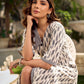 Modern white and grey Ikat shirt dress elevated with an asymmetrical checkered Ikat collar and contrast black accents.