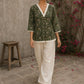Earthy deep olive Jaipur floral top featuring box-pleated sleeves and delicate Hakoba accents for timeless elegance.