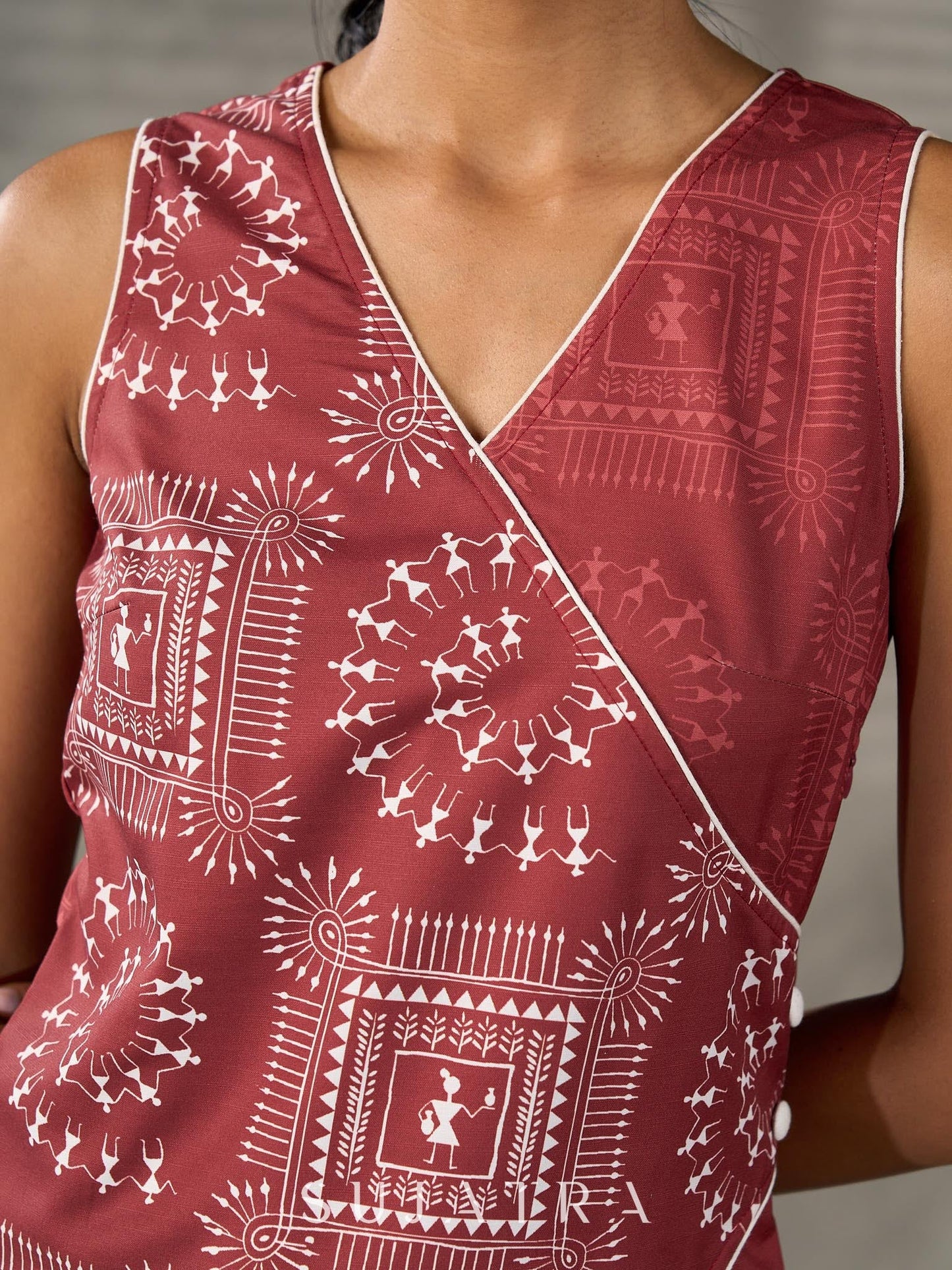Terracotta warli printed overlap dress with off white accents