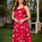 Pretty red dress featuring a sweetheart neckline, pleated waist panel, and soft gathers that create a graceful flow.
