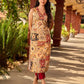 Graceful cream all-over printed kurta adorned with an overlapping maroon zardozi-embroidered neckline and bold maroon detailing.