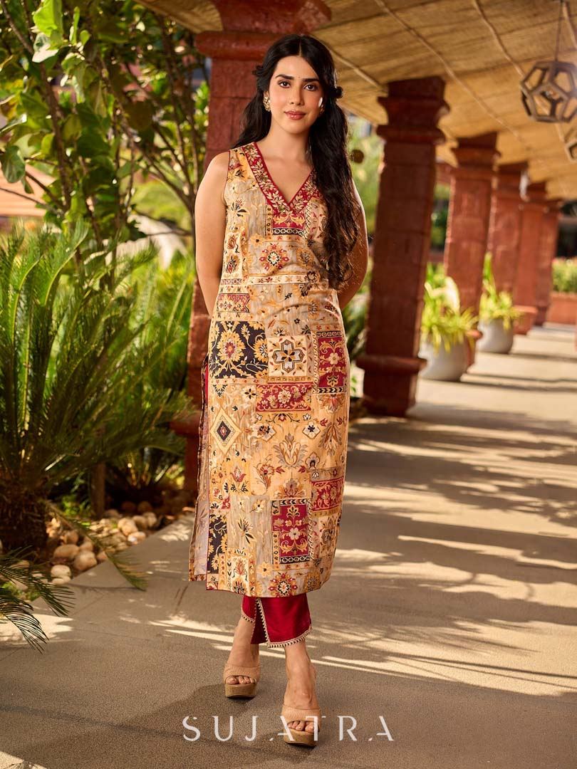 Graceful cream all-over printed kurta adorned with an overlapping maroon zardozi-embroidered neckline and bold maroon detailing.