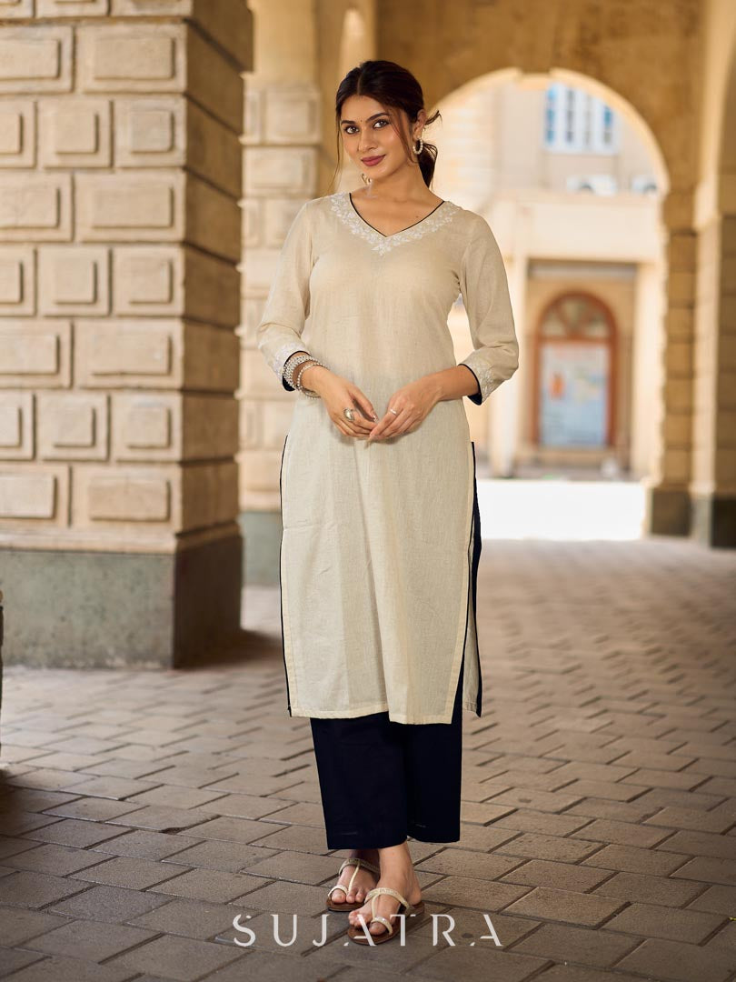 Pristine Off-White Cotton Flex Straight Kurta Featuring Subtle Monochrome Embroidery on Neckline & Sleeve Cuffs