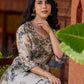 Elegant black–white floral kurta featuring a graceful bias silhouette, intricate mirror embroidery on the neck and sleeves, and a sweetheart neckline.