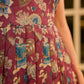 Playful wine floral summer dress elevated with dainty straps and pleats from the waistline