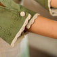 Serene ivory and sage green ombré overlap hakoba dress with olive button accents.