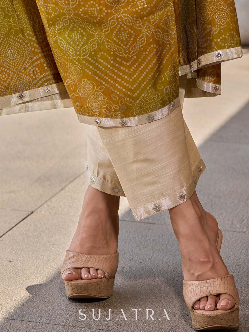 Exquisite yellow Bandhani printed kurta with a delicate off-white tissue overlay and refined accents.
