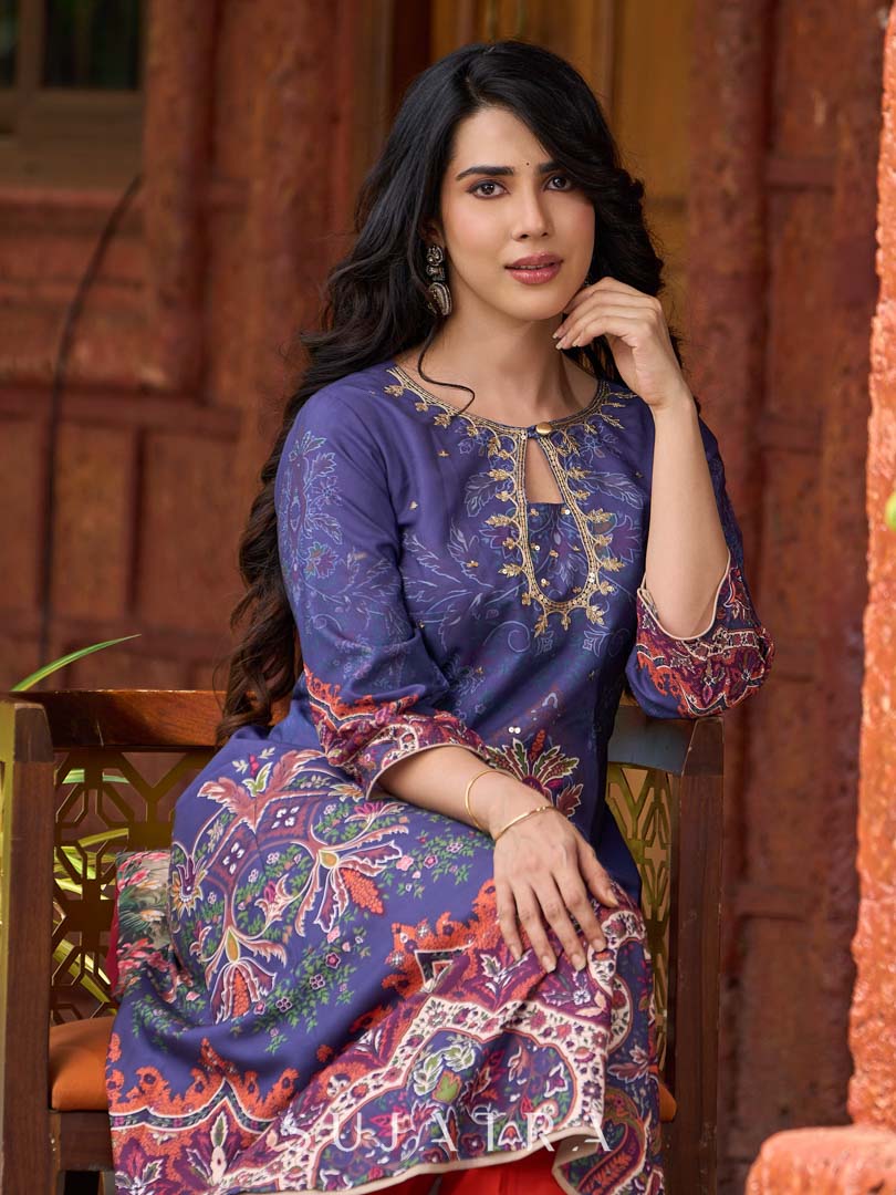 Stunning royal blue printed kurta adorned with handcrafted zardozi and sequin detailing on the keyhole neck.