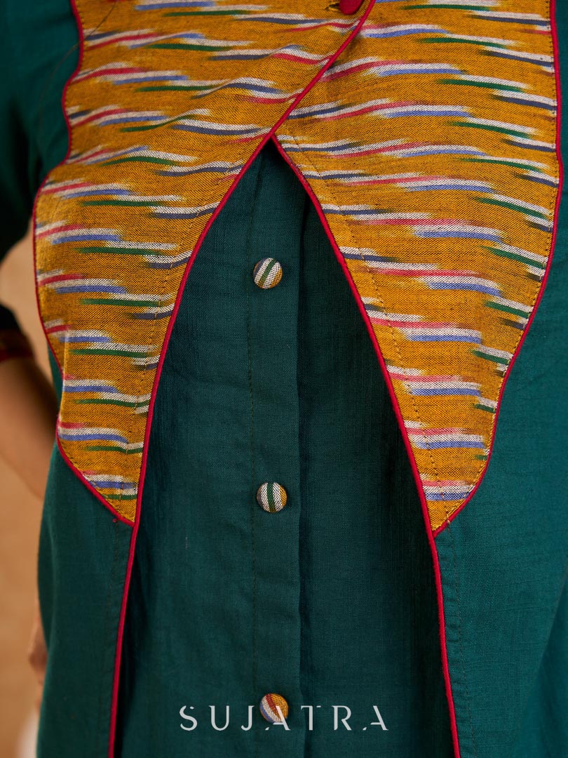 Sophisticated bottle green and mustard Ikat jacket featuring an overlapping neckline closure, front-open design, and rich maroon accents, offering a composed, tailored silhouette for corporate wear.