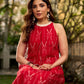 Statement red Ikat halter-neck dress accented in white, designed with a box pleat at the neckline for fluid drape.