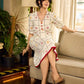 Soft off-white block printed rayon dress with intricate all-over hand block printed checks and florals, a gently gathered yoke, and rich red accents for a refined, elegant everyday look.