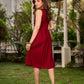 Statement sleeveless Ajrakh dress elevated with a folded collar and graceful maroon pleats.