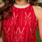 Statement red Ikat halter-neck dress accented in white, designed with a box pleat at the neckline for fluid drape.