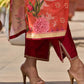 Elegant orange floral printed kurta with hand-embroidered sequin and cut dana detailing on the yoke and rich maroon accents.