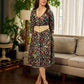 Classic bottle green Kalamkari printed dress with a beige elegant pintuck detailing.
