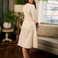 Artisan-crafted off-white Madhubani dress with beautiful hand-painted motifs and trim.
