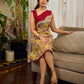 Elegant cream and maroon Madhubani dress featuring sophisticated wavy pintuck flap detailing.