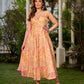 Effortless sunshine yellow floral dress designed with a delicate neckline, gathered straps, and a breezy, flowy form.