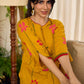 Mustard block printed pintuck dress with hand block red and pink vine floral motifs, accented with red and olive details for a rich, elegant look.