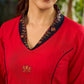 Elegant red dress featuring delicate, hand-painted Madhubani lotus motif detailing.