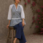 Soft blue Jaipur hairline stripe top featuring Hakoba raglan sleeves and a flattering gathered waist silhouette.