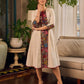 White and black striped dress with Kalamkari panel and tie-up neckline.