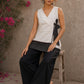 White cotton wrap-style top featuring contrast block print mantra borders, side tie, and modern silhouette.