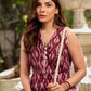 Statement maroon Ikat sleeveless dress elevated with pintuck detailing through the bodice and box pleats beyond the darts for a soft, flowing finish.